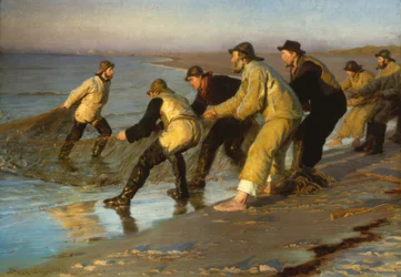 Rybacy wyciągają sieci na plaży w Skagen