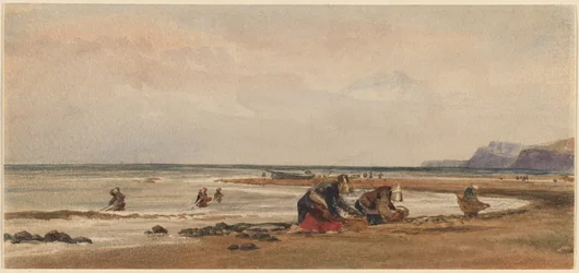 Zbieraczki wodorostów na brzegu w Redcar w Yorkshire