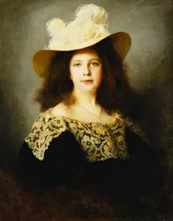 Portret Mici Lukacs, lat 10, ubrana w ciemnoniebieską sukienkę z koronkowym kołnierzem