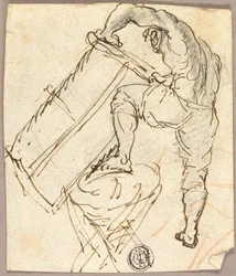 Mężczyzna piłujący drewno
