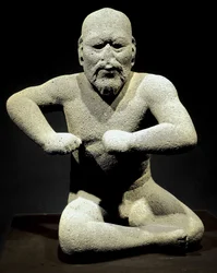 Sztuka prekolumbijska, cywilizacja olmecka: „Zapaśnik”, rzeźba z Veracruz w Meksyku. Narodowe Muzeum Antropologiczne, Meksyk, Meksyk