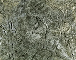 Prehistoria, sztuka naskalna: petroglif (graffiti na kamieniu) przedstawiający scenę polowania. neolit, epoka kamienia. (Azerbejdżan) Epoka brązu. Baku, Państwowe Muzeum Historii Religii Azerbejdżanu
