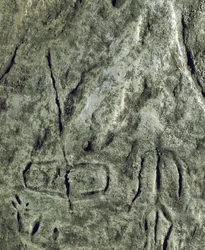 Prehistoria, sztuka naskalna: petroglif (graffiti na kamieniu) przedstawiający łódź i postać ludzką. neolit, epoka kamienia. (Azerbejdżan) Epoka brązu. Baku, Państwowe Muzeum Historii Religii Azerbejdżanu