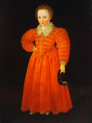 Portret małego chłopca, stojącego pełnej długości w czerwonej sukience z białym koronkowym kołnierzem, trzymającego czarny kapelusz,