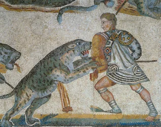 Mozaika przedstawiająca scenę polowania na dzikie zwierzęta, detal przedstawiający gladiatora zabijającego dzikie zwierzę
