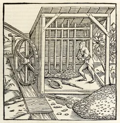 Wydobywanie z kołem wodnym, z wydania „Cosmographia” z 1550 r. Sebastiana Munstera (drzewryt)