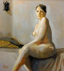 Siedząca naga kobieta