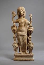Terracotta statuette of Venus, or a young woman dressed at Venus, at her toilet, c.200-230 (terracotta)