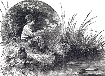 Młody chłopak łowiący ryby