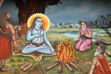 Obraz przedstawiający świętego człowieka (siedzącego na skórze tygrysa jak Shiva) w otoczeniu wyznawców Haridwar India