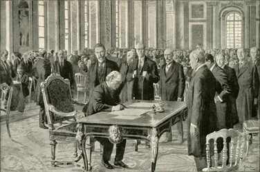 Premier Wielkiej Brytanii podpisujący traktat pokojowy, 1919.
