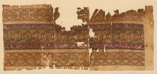 Tiraz z taśmami giloszowymi, 1100s.
