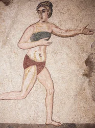 Detal Komnaty Dziesięciu Dziewic lub mozaika „Dziewczynki w bikini”. Działanie. III - IV wiek. Rzymska willa Casale, Sycylia. UNESCO.