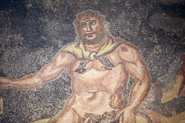 Sala Polifemów. Szczegół cyklopa pożerającego wnętrzności kozy. III - IV wiek. Rzymska willa Casale, Sycylia. UNESCO.