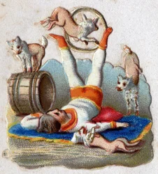 Cyrk: pogromca zwierząt łapiący zwierzęta ma psy, w tym jeden przechodzący w obręczy. Chromolitografia około 1890 r.