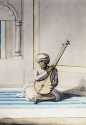 Kultura, cywilizacja i społeczeństwo indyjskie: Muzyk grający na Thambourah (Tambura), tradycyjnym instrumencie Indii. Grawerowanie 1808.