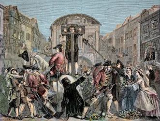 Daniel Defoe (De Foe) (1659-1731) pod pręgierzem w Londynie w 1703 r. za opublikowanie jego ironicznego traktatu „Najkrótsza droga z dysydentami”” – pisarz i awanturnik Daniel Defoe (1659-1731) skazany w 1703 r. na pręgierz za jego scenariusze przeciwko in