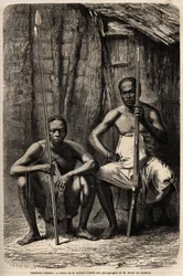 Portret dwóch wojowników Bakali. Rysunek H. Castelli, ilustrujący podróż do Gabonu w latach 1861-1864 doktora Gryfona du Bellay. Grawerowanie w „”Le tour du monde””, pod redakcją Edouarda Chartona