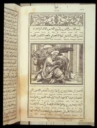 Św. Łukasz Ewangelista w „Biblii”” napisanym po łacinie i arabsku.
