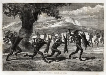 Obbos (plemię Ugandy) wykonujące taniec wojenny. Grawer dla ilustracji wyprawy do jeziora Albert w latach 1861-1864, autorstwa Sir Samuela White Bakera, w „Le tour du monde, nouveau journal des voyages” wydanej pod kierunkiem Edouarda Chartona