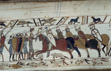 Podbój Anglii przez księcia Normandii Wilhelma Zdobywcy (1027-1087) w 1066: scena bitwy pod Hastings przeciwstawiającej się piechocie normańskiej kawalerii saskiej Fragment gobelinu z Bayeux lub Haft królowej Matyldy