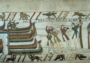 Podbój Anglii przez armię księcia Normandii Wilhelma Zdobywcy (1027-1087): ledwo zbudowane statki wypływają w morze Fragment gobelinu z Bayeux lub Haft królowej Matyldy