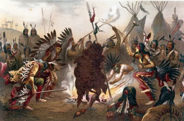 Rytuał Indian amerykańskich (Indianie z równin Dakoty Południowej): Taniec wojenny Siuksów. chromolitografia z „Rasy ludzkiej” Ratzela, ok. 1890 r.