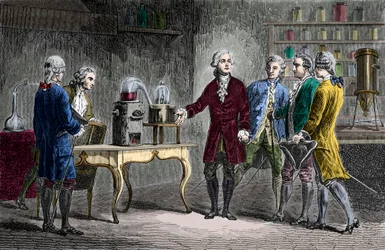 Antoine Laurent Lavoisier (1743-1894) wykonuje rozkład powietrza w 1776 r. - Antoine Laurent Lavoisier Angielski chemik, pokazując kolegom naukowcom swój eksperyment, który ujawnił skład powietrza w 1776 r. - Grawerowanie od Louisa Figuiera
