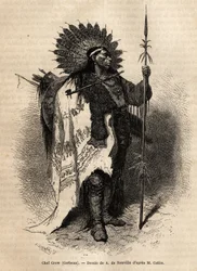 Główny Żółty Mokasyn z plemienia Indian Crow, żyjący wzdłuż rzeki Lewis. Rycina ilustrująca wyprawę wśród plemion indiańskich dorzeczy Kolumbii i Górnego Missouri, autorstwa G. Catlina, w 1855 r., opublikowana w „”le tour du monde””, pod