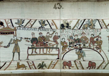 Debarques w Anglii, ramiona Wilhelma Zdobywcy (1027-1087) robią ucztę, czekając na walkę z saską bronią Harolda II. Guillaume jest otoczony przez baronów i Eveque Odon Szczegół gobelinu z Bayeux lub haftu królowej Matyldy