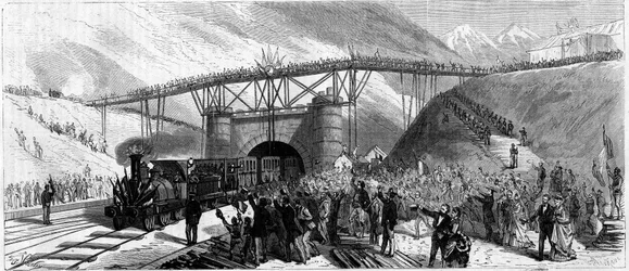 Inauguracja tunelu Mont Cenis (Monte Cenisio) w 1871 roku. Przyjazd pociągu zaprasza do Bardonneche (Bardonecchia)