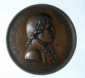 Portret Giovanniego Battisty Pergolesiego (Jean Baptiste Pergolese, Jean-Baptiste) (1710 - 1736). Medalion z brązu. Muzeum Schodów. Mediolan