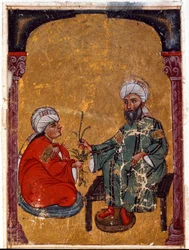 Doktor i botanik Pedanius Dioscoride (Dioscorides) (40-90 ne) wyjaśniający jednemu ze swoich uczniów zalety miniaturowych roślin wywodzących się z jego traktatu „De materia medica” (Fol. 2 verso) Z Iraku. 1229 Biblioteka Muzeum Topkapi Sarayi, Stambuł