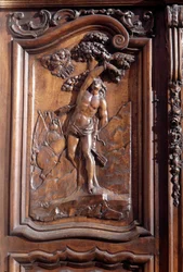Męczeństwo San Sebastian, fragment rzeźbionych drewnianych drzwi kościoła Niepokalanego Poczęcia, Menton.