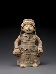 Wizerunek kobiety stojącej, 600-900 (terakota z pigmentem)