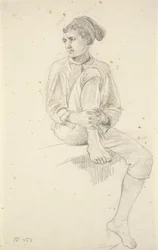 Siedzący młody rybak