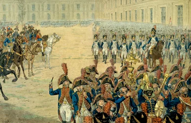 Pierwszy przegląd gwardii konsularnej na dziedzińcu Tuileries przez Napoleona I Bonaparte (1769-1821). Po przyjęciu konstytucji w 1800 r. rząd opuścił Peer-Luxembourg, aby osiedlić się w Tuileries. W dniu jego instalacji Fi